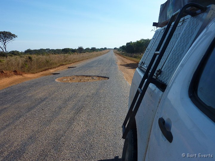 P1010237.JPG - Road with dangerous potholes